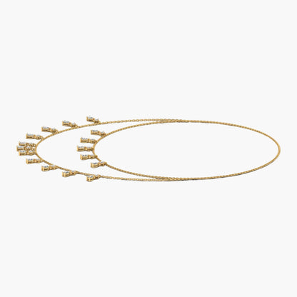 Gold necklace with small pendants on a white background, branded 'Green Lab'.