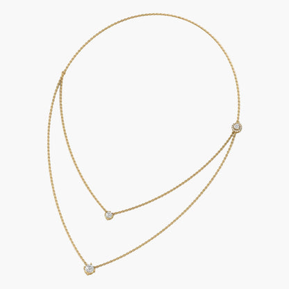 Gold necklace with small diamonds on a white background, branded 'Green Lab'.