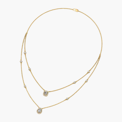 Gold necklace with small diamonds on a white background, branded 'Green Lab'.