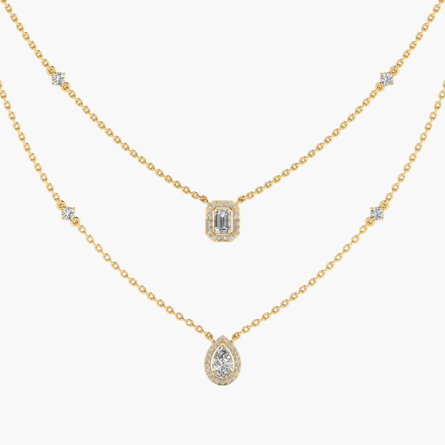 Gold necklace with diamond pendants on a white background