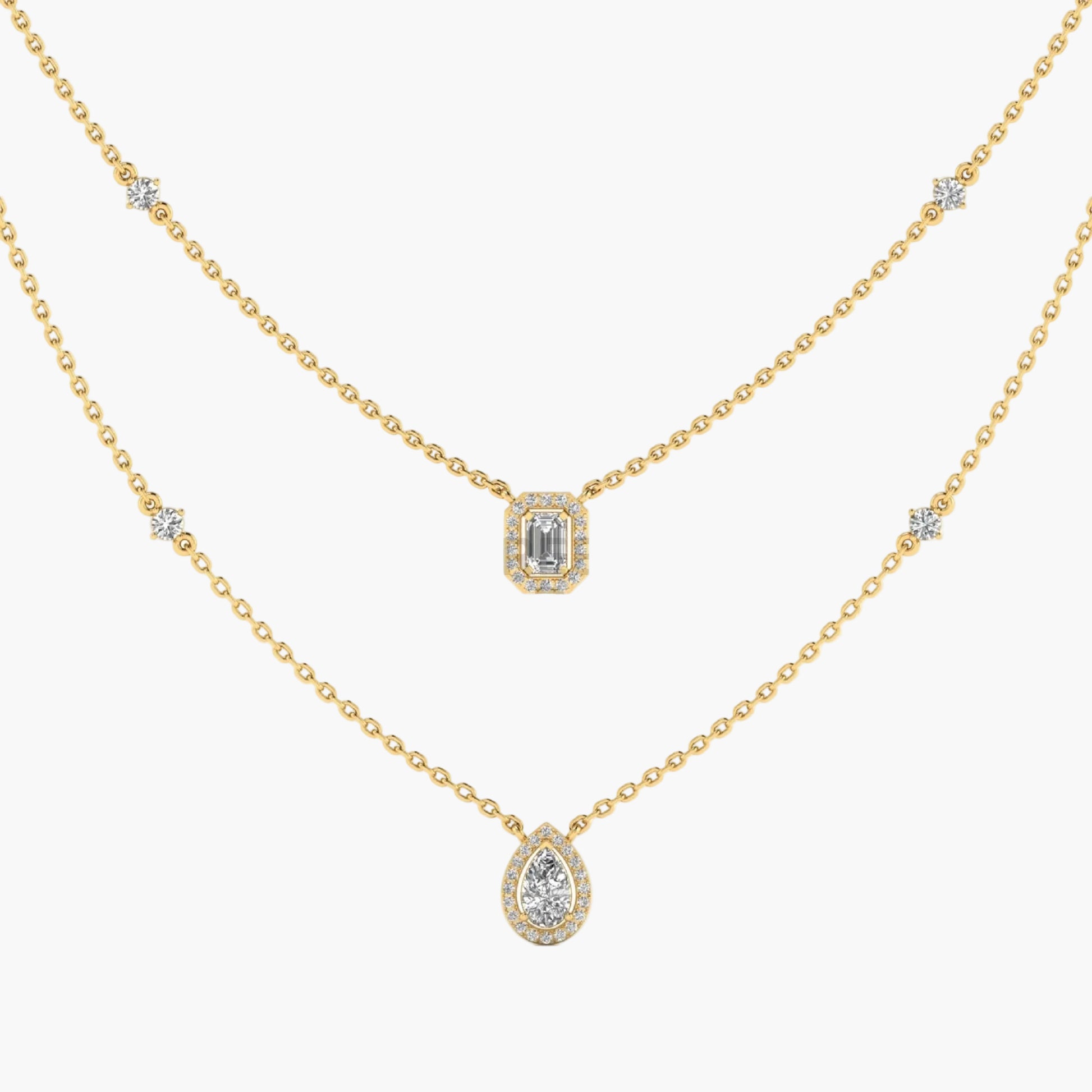 Gold necklace with diamond pendants on a white background