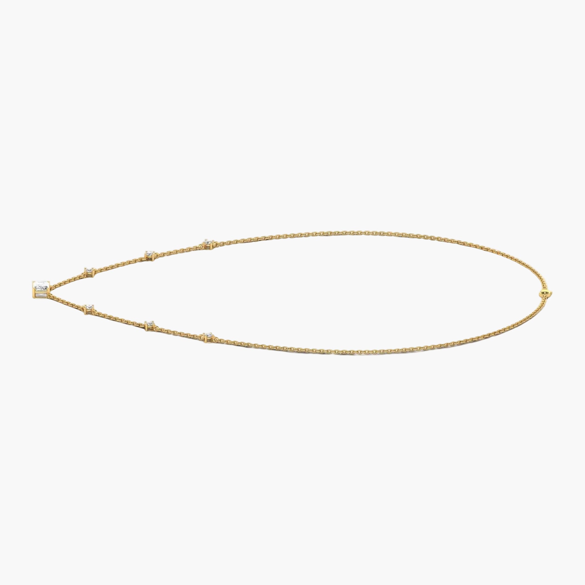 Gold necklace on a white background with 'Green Lab' branding.