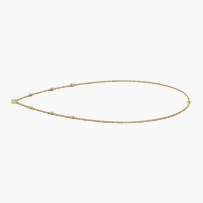 Gold necklace on a white background with 'Green Lab' branding.