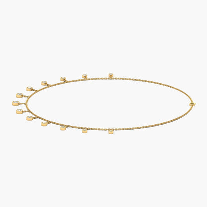 Gold necklace with small beads on a white background, branded 'Green Lab'.