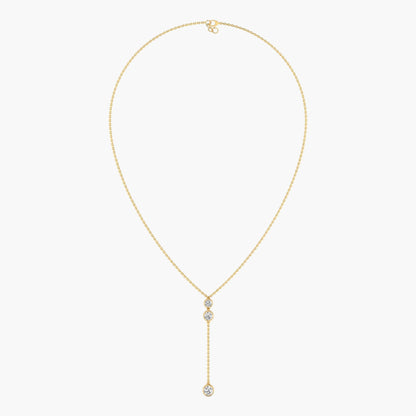 Gold necklace with a diamond pendant on a white background