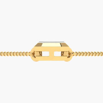 Gold necklace with a rectangular pendant on a white background
