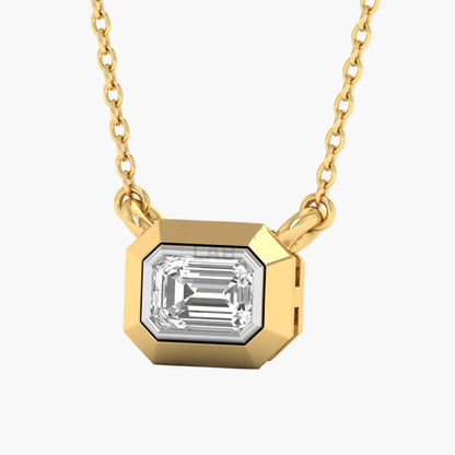 Gold necklace with a diamond pendant on a white background