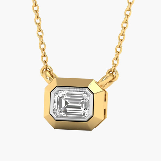 Gold necklace with a diamond pendant on a white background