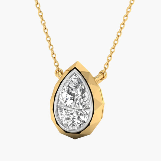 Gold necklace with a teardrop-shaped diamond pendant on a white background