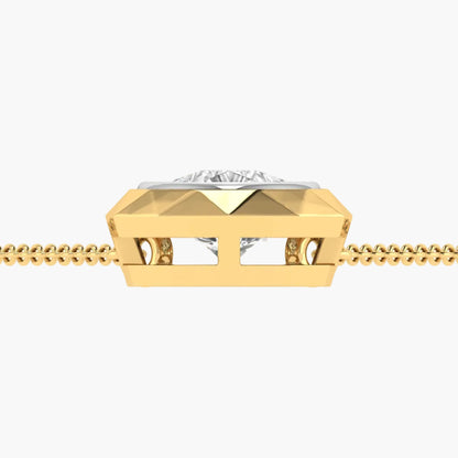 Gold pendant with a diamond on a white background