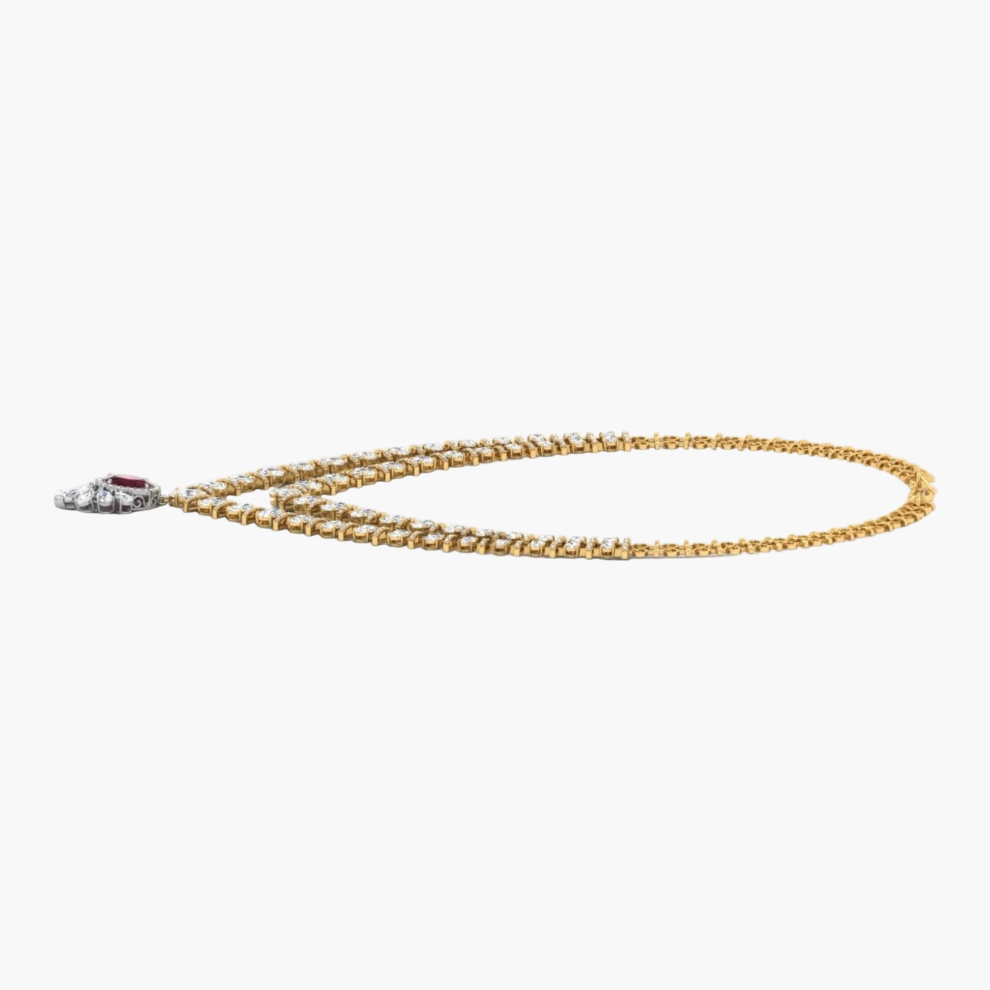 Gold chain necklace on a white background