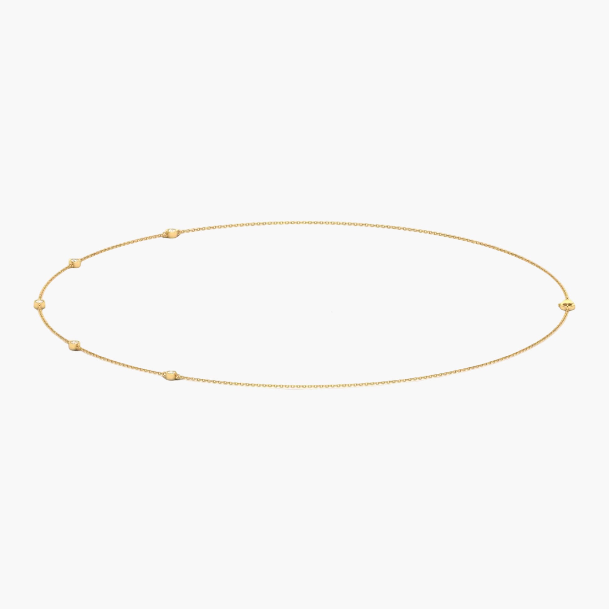 Gold necklace with small beads on a white background, branded 'Green Lab'.