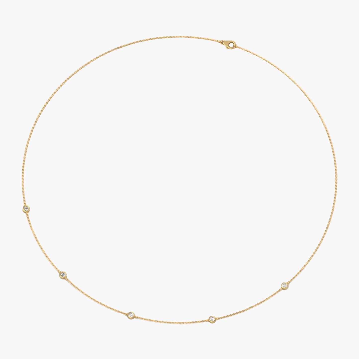 Gold necklace with small stones on a white background, branded 'Green Lab'.