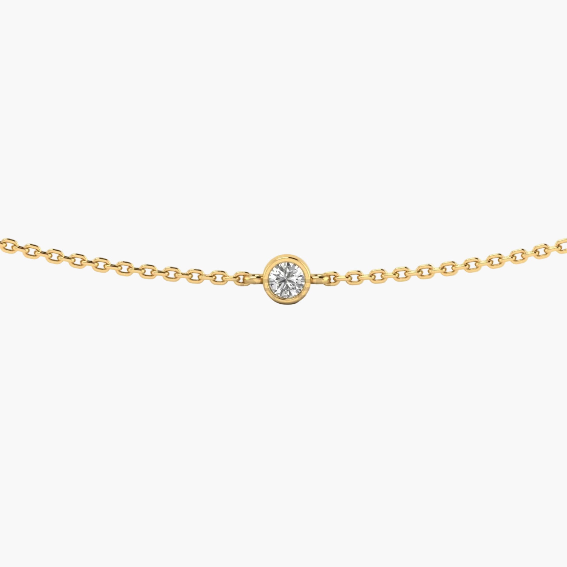 Gold necklace with a diamond pendant on a white background