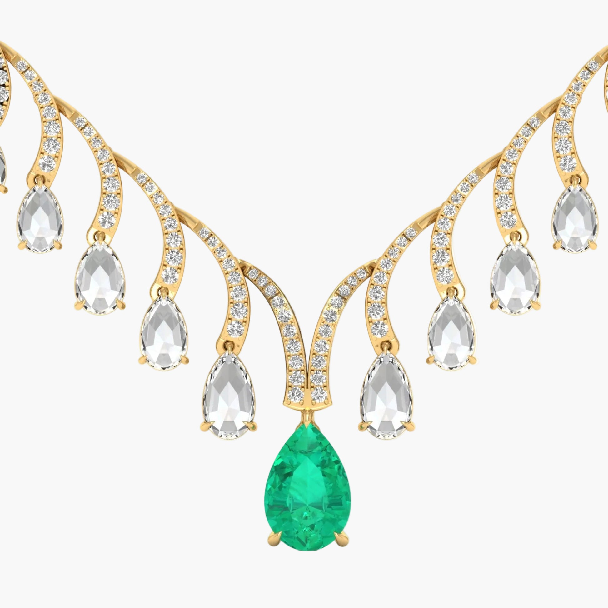Gold necklace with emerald and clear gemstones on a white background