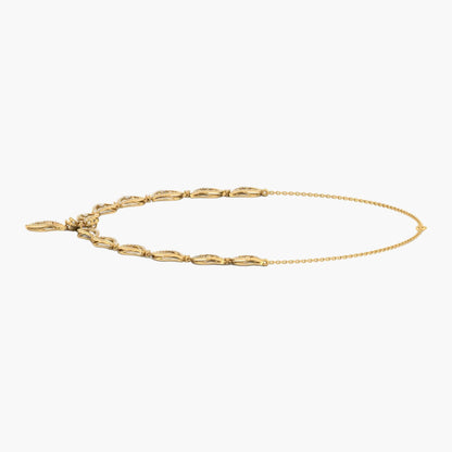 Gold bracelet on a white background with 'Green Lab' branding.