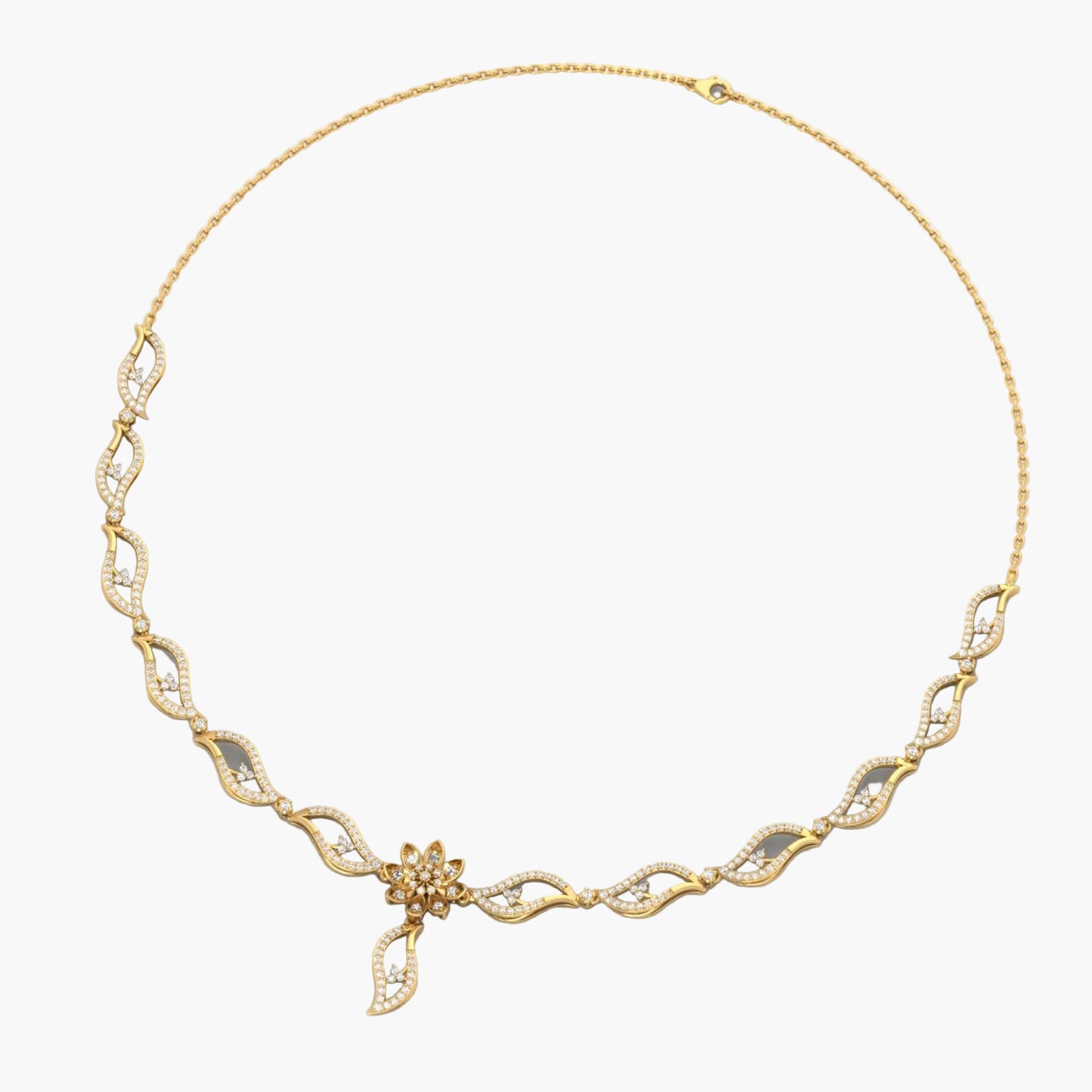 Gold necklace with intricate design on a white background, featuring 'Green Lab' branding.