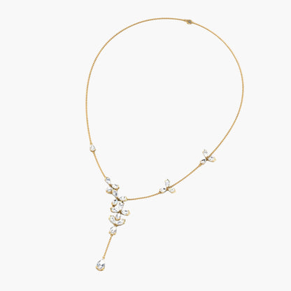 Delicate gold necklace with pearls on a white background, branded 'Green Lab'.