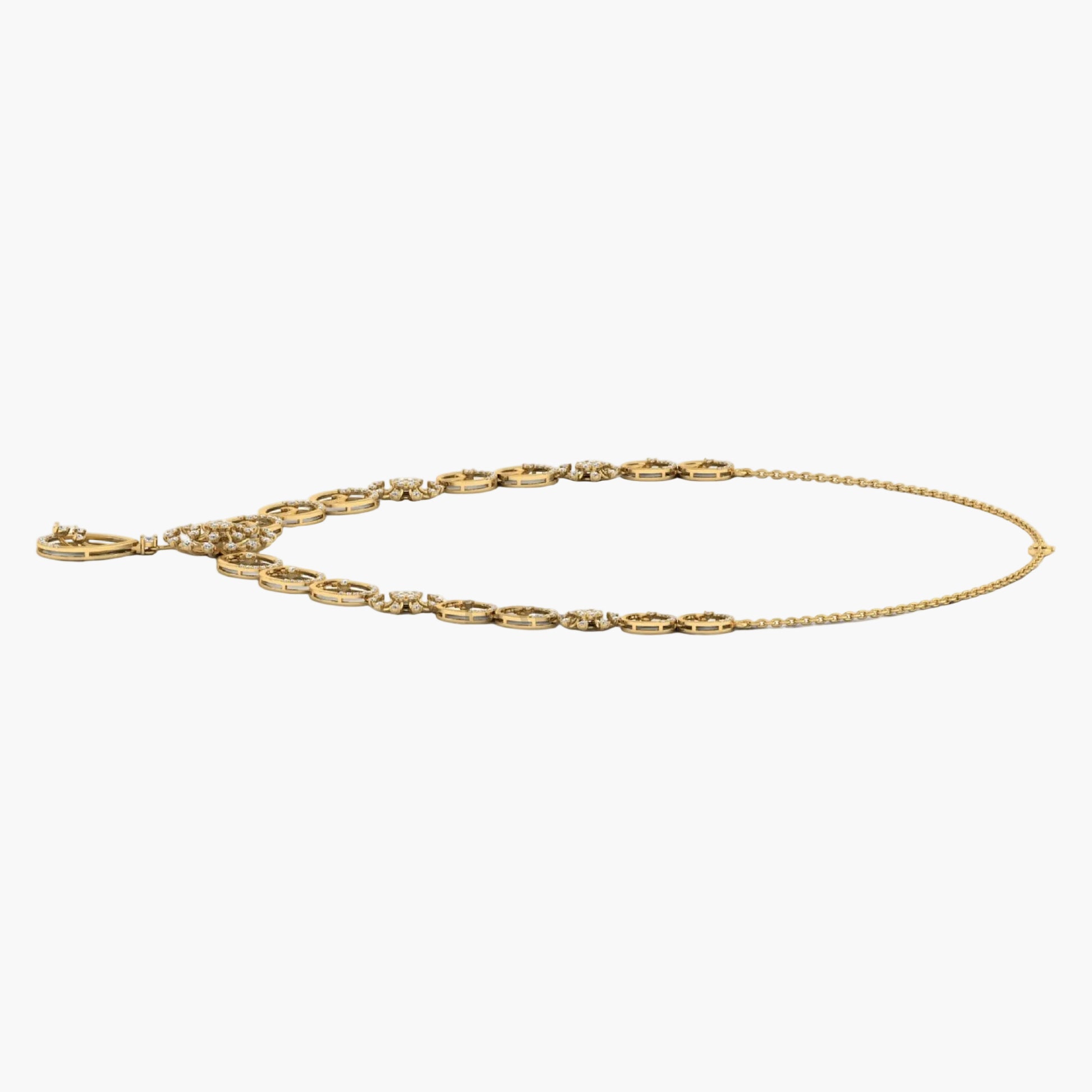 Gold anklet on a white background with 'Green & Co' branding.