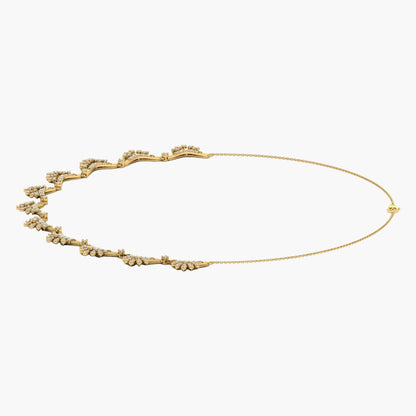 Gold necklace with floral design on a white background, branded 'Green Lab'.