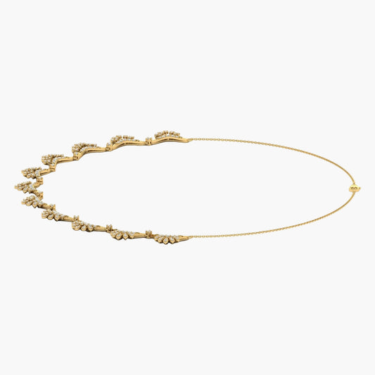 Gold necklace with floral design on a white background, branded 'Green Lab'.
