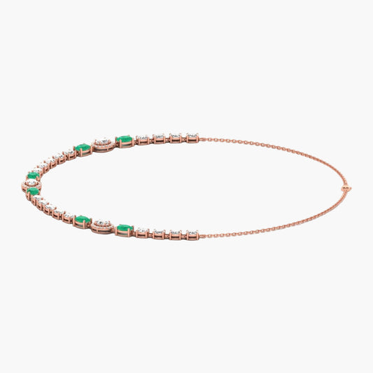 Rose gold bracelet with green gemstones on a white background, branded 'Green Lab'.