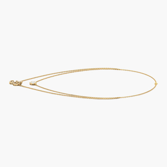 Gold necklace on a white background with 'Green Lab' branding.