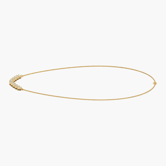 Gold necklace on a white background with 'Green Lab' branding.