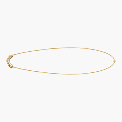 Gold necklace on a white background with 'Green Lab' branding.