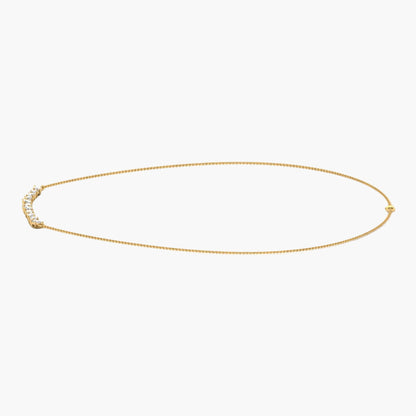 Gold bracelet on a white background with 'Green Lab' branding.
