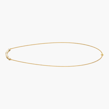 Gold necklace on a white background with 'Green Lab' branding.