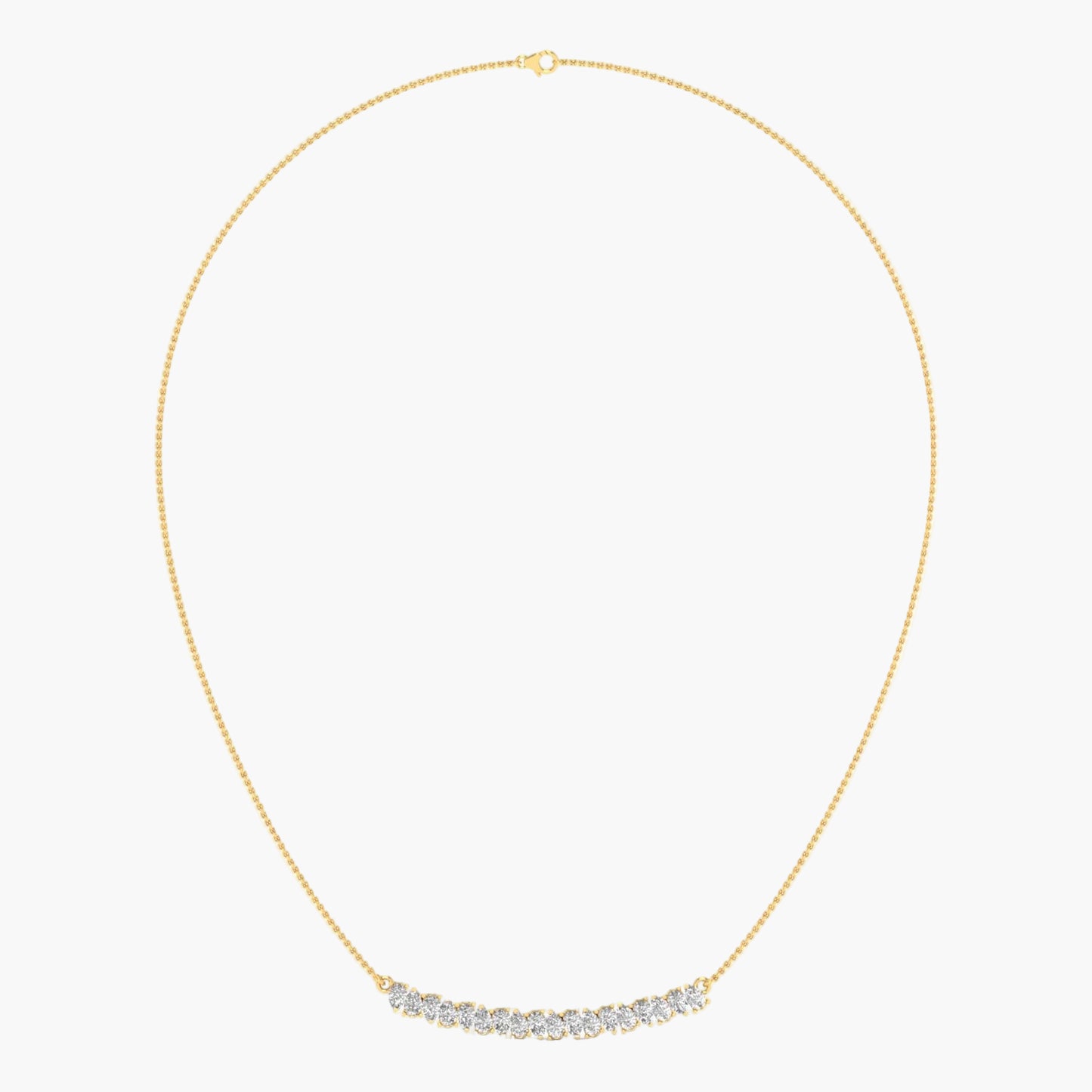 Gold necklace with small diamonds on a light gray background