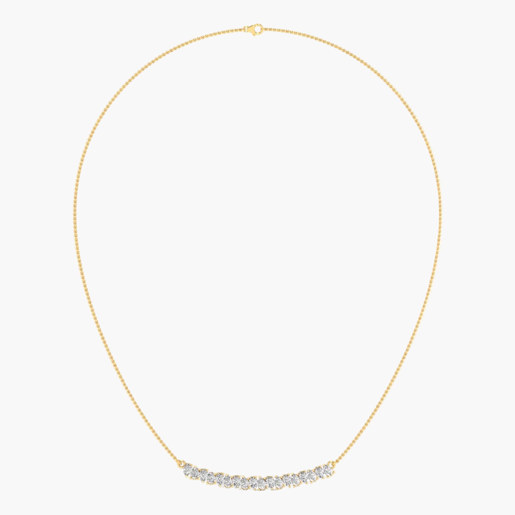Gold necklace with small diamonds on a light gray background