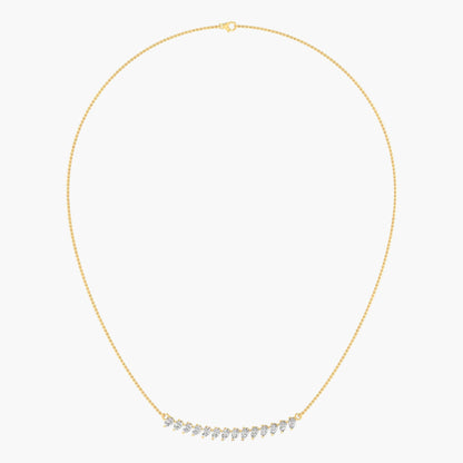 Gold necklace with small diamonds on a white background, branded 'Green Lab'.