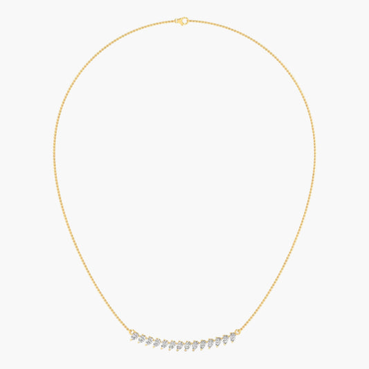 Gold necklace with small diamonds on a white background, branded 'Green Lab'.