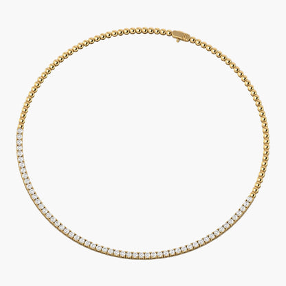 Gold necklace with diamonds on a white background, branded 'Green Lab'.