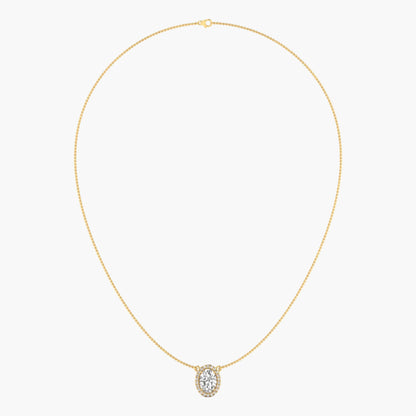 Gold necklace with a diamond pendant on a light gray background