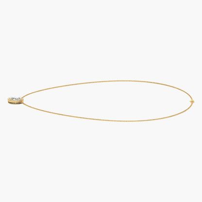Gold necklace with a small pendant on a white background, branded 'Green Lab'.