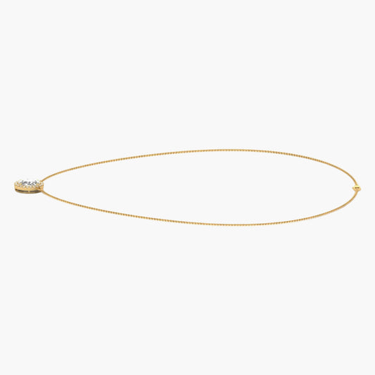 Gold necklace with a small pendant on a white background, branded 'Green Lab'.