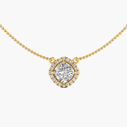 Gold necklace with a diamond pendant on a white background