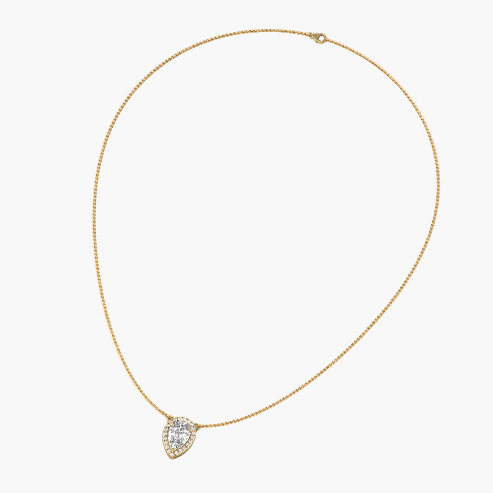 Gold necklace with a heart-shaped diamond pendant on a white background