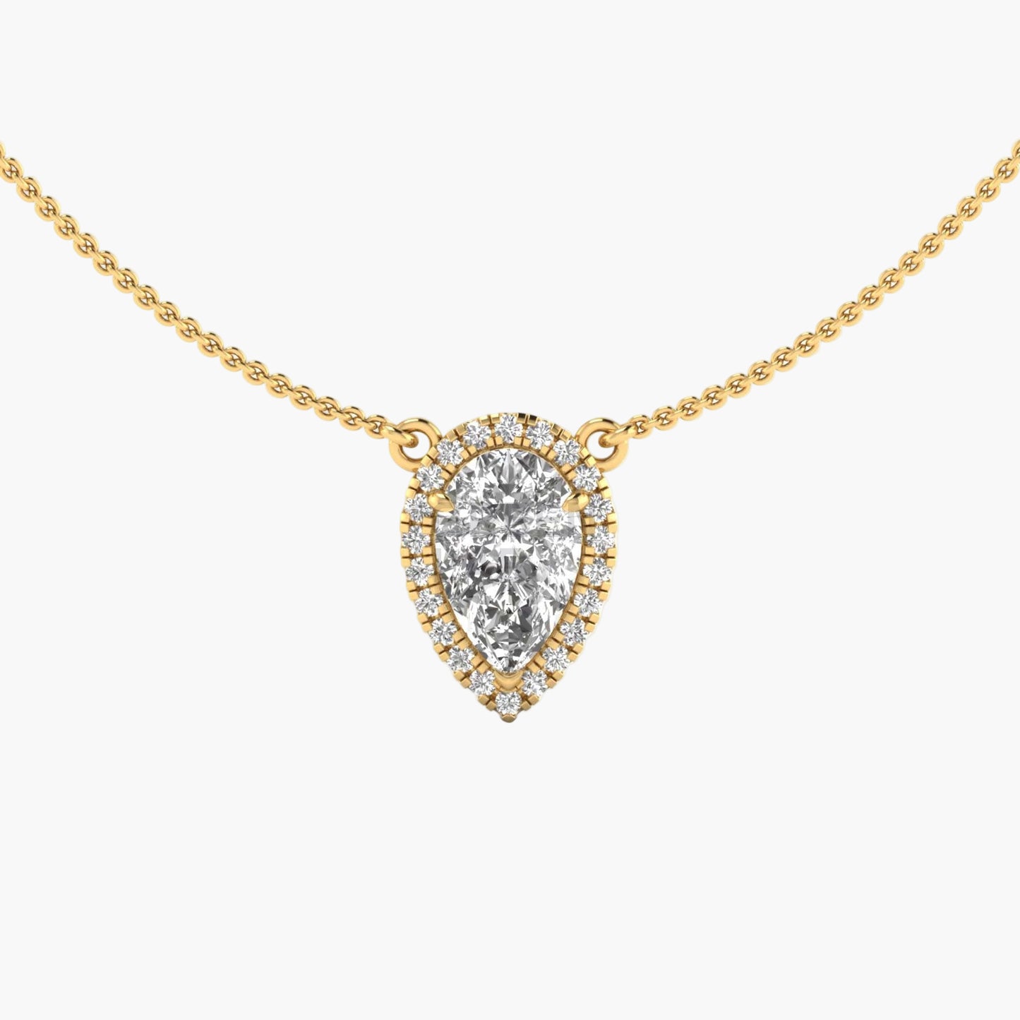 Gold necklace with a teardrop-shaped diamond pendant on a white background