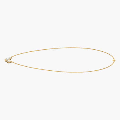 Gold necklace on a white background with 'Green Lab' branding.