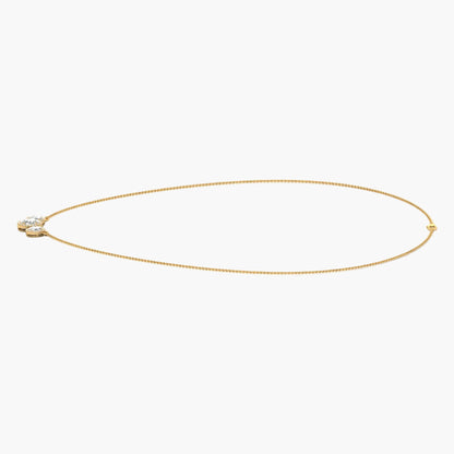 Gold necklace on a white background with 'Green Lab' branding.