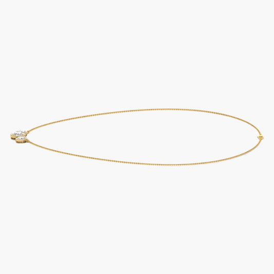 Gold necklace on a white background with 'Green Lab' branding.