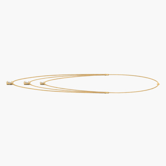 Gold necklace on a white background