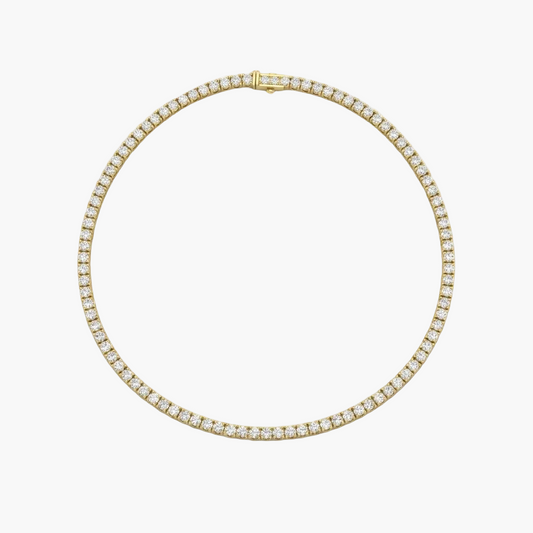 Gold necklace with diamond accents on a white background