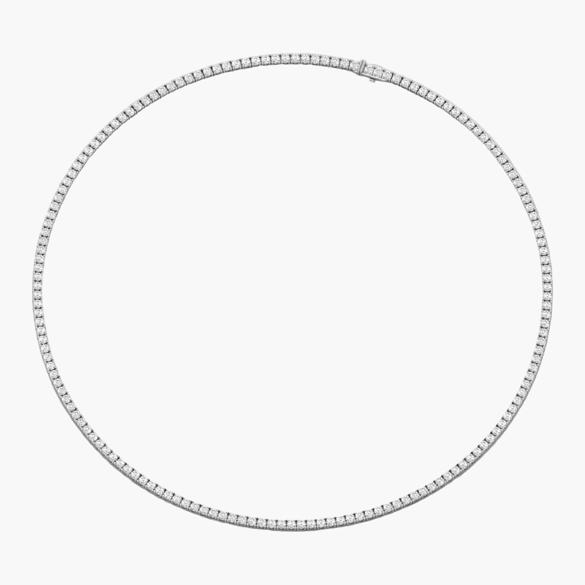 Silver necklace with small diamonds on a white background, branded 'Green Lab'.