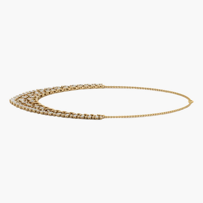 Gold chain necklace on a white background