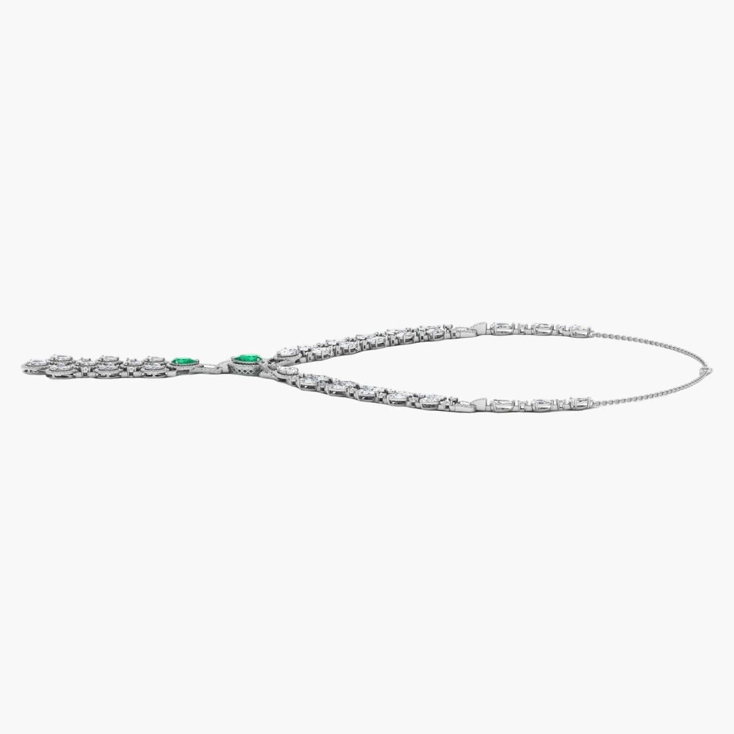 Silver necklace with green gemstones on a white background